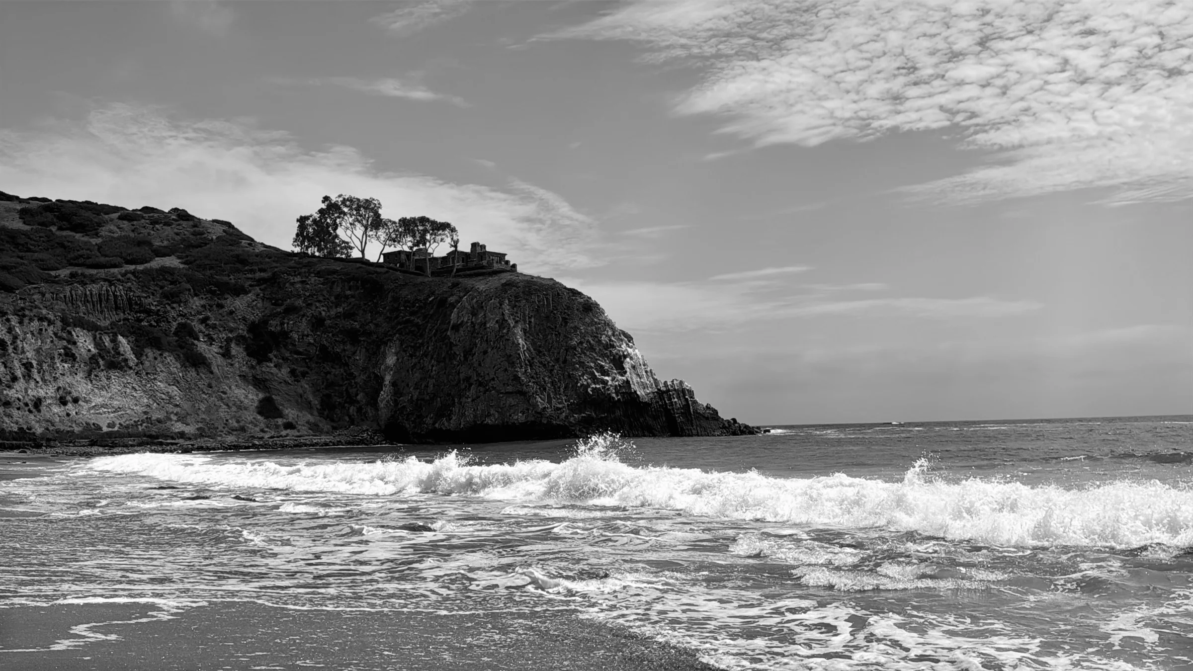 A quiet Southern California ocean cliff in black and white