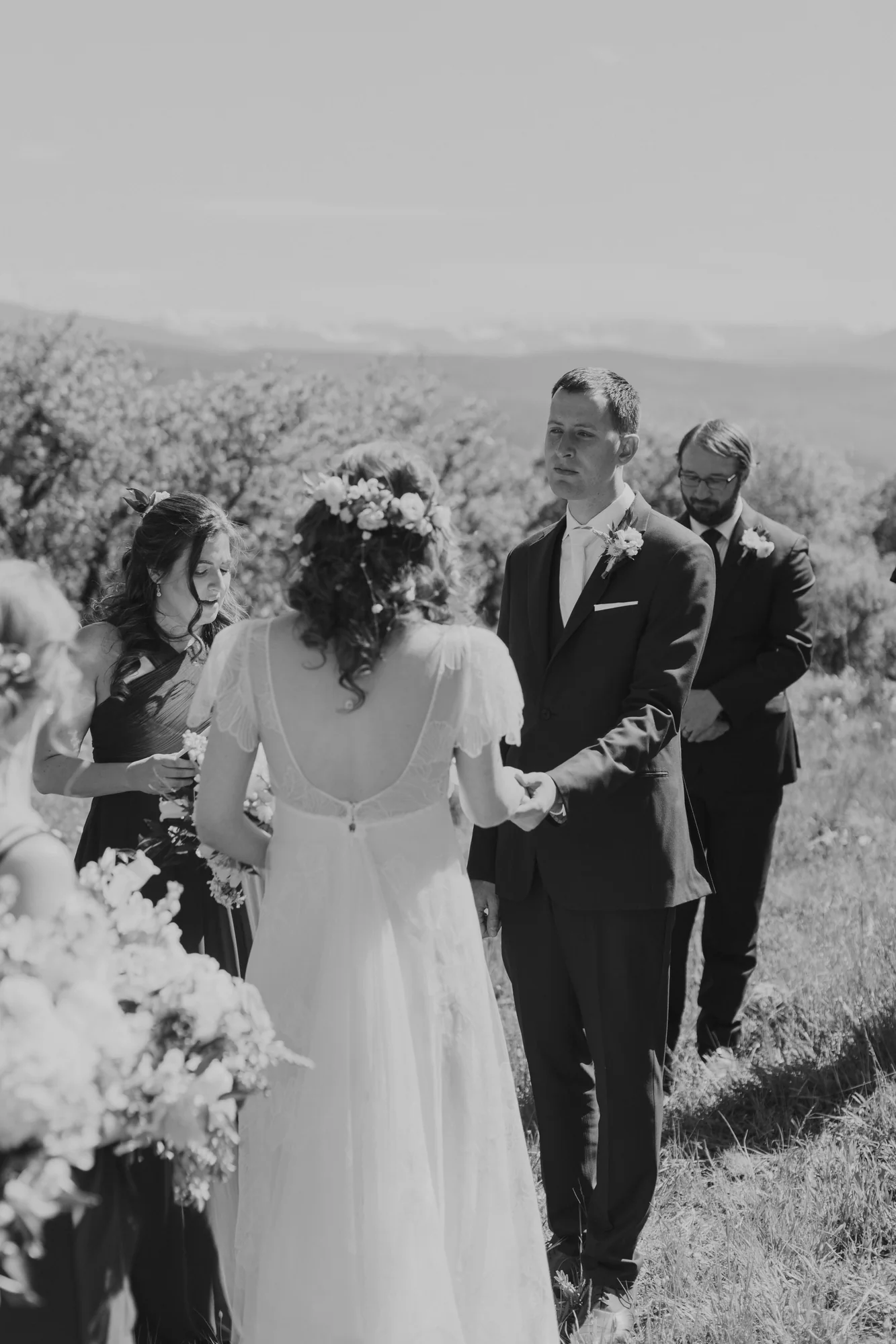 Parisa officiating an intimate mountain wedding ceremony in Colorado